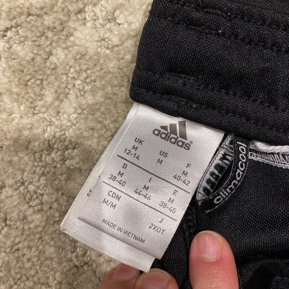 Women’s medium adidas pants with zipper slit at ankle. - Picture 2 of 3